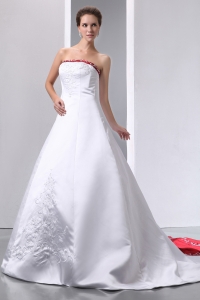 Luxurious A-line Strapless Chapel Train Satin Embroidery With Beading Wedding Dress