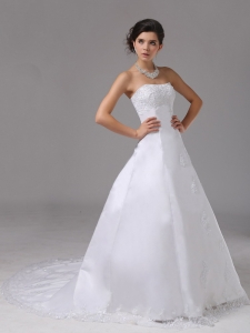 A-line Romantic Wedding Dress With Lace Strapless Brush Train